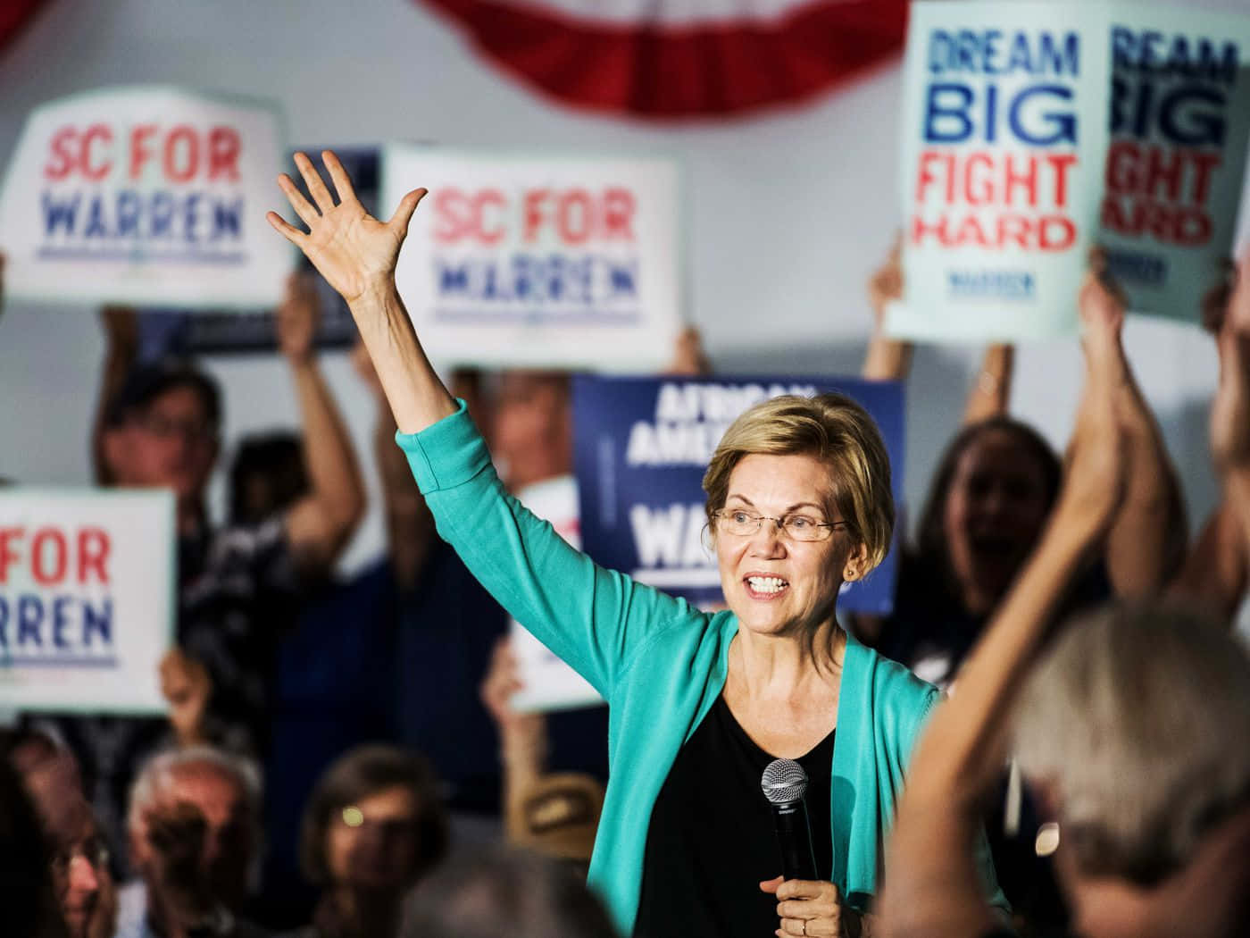 Elizabeth Warren With Campaign Slogans Background