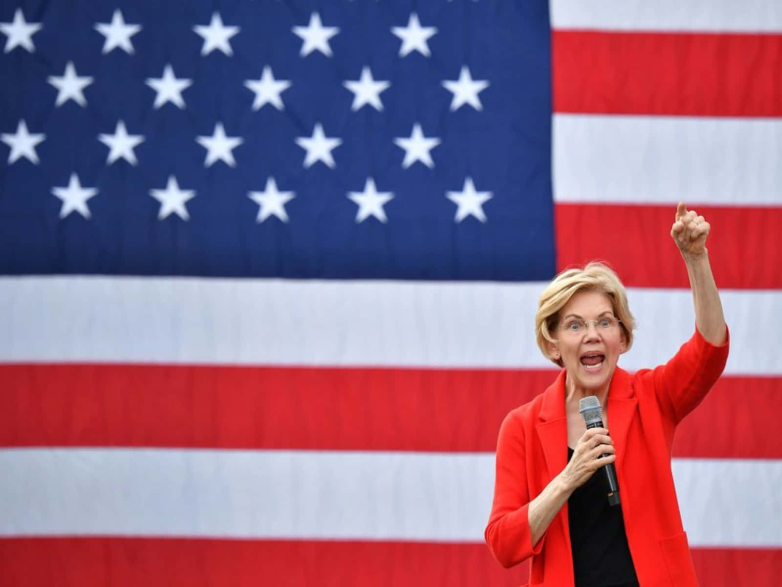Elizabeth Warren With Raised Fist Background