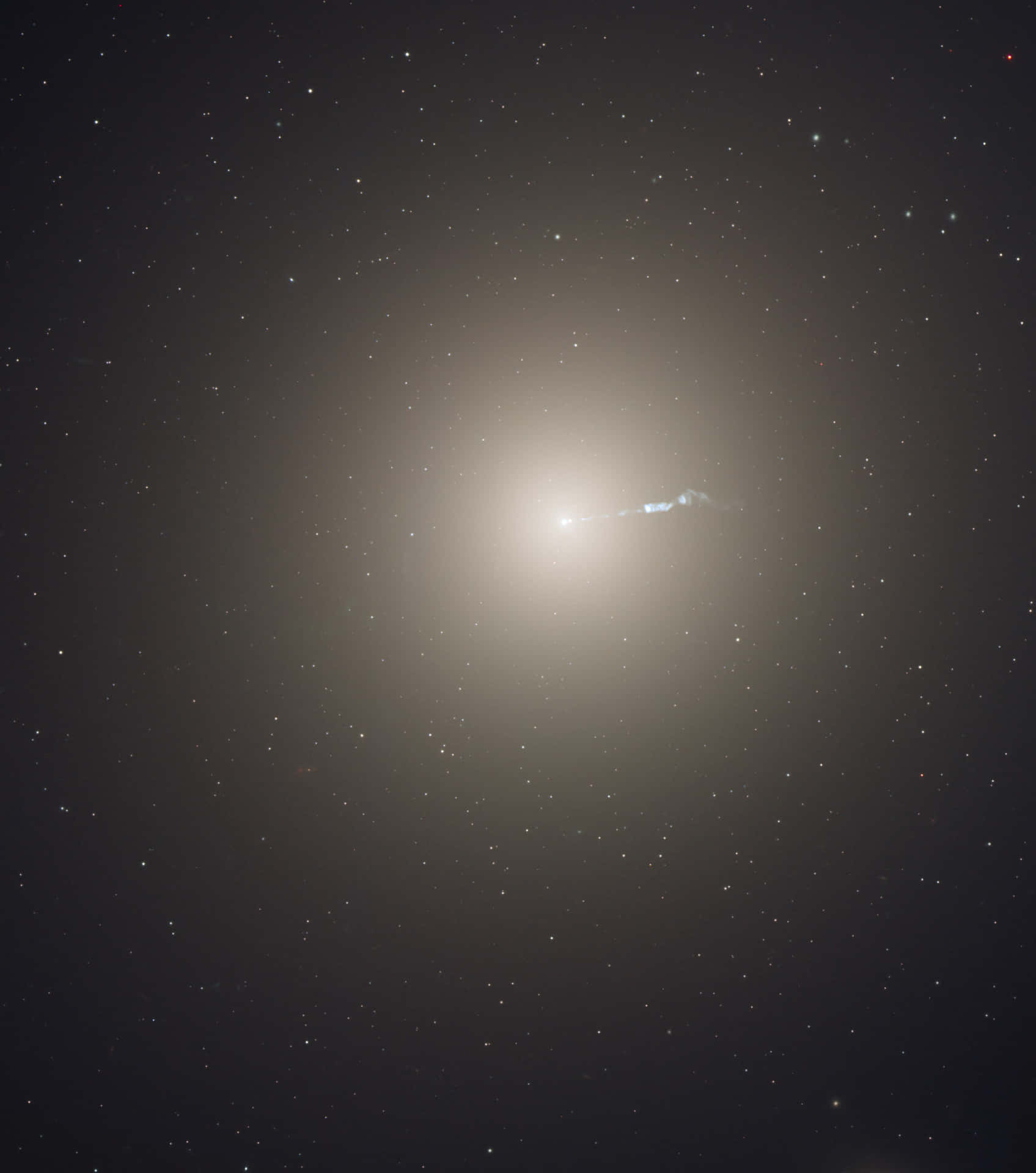 Majestic Elliptical Galaxy in the Cosmos Wallpaper