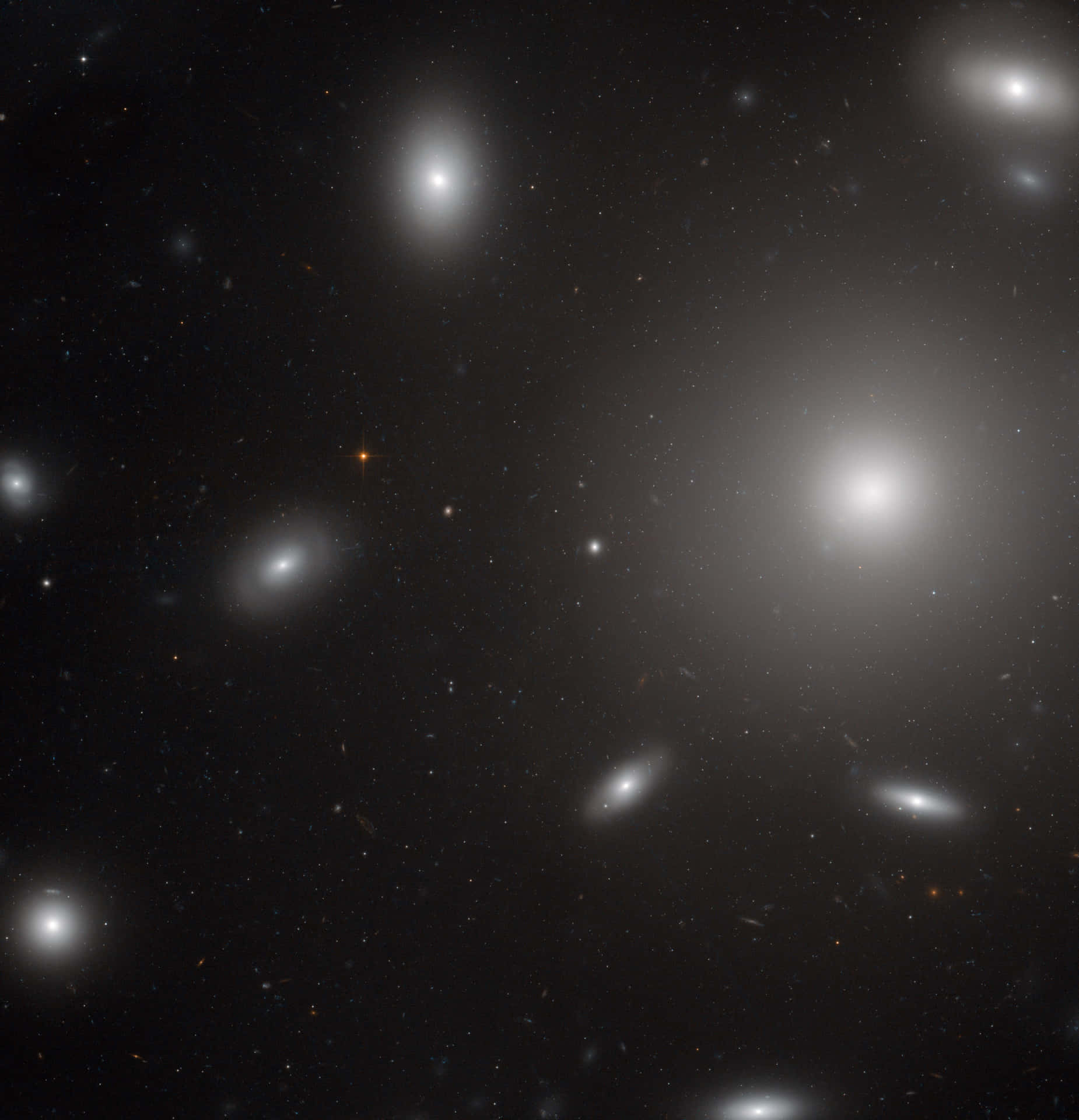 Caption: Majestic Elliptical Galaxy in High Resolution Wallpaper