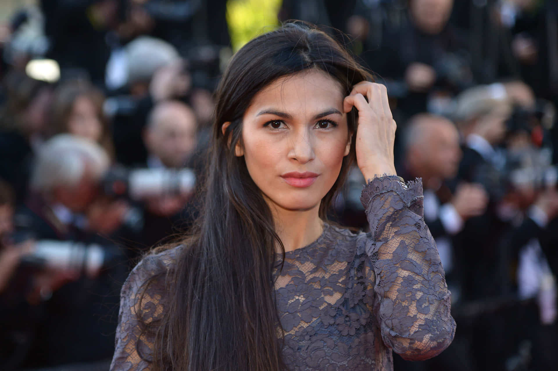 Elodie Yung at a red carpet event Wallpaper