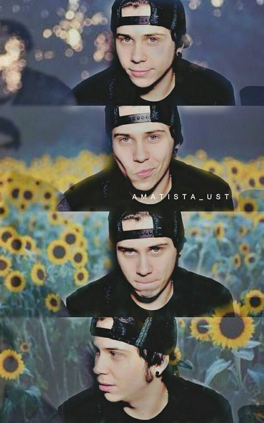 Elrubiusomg enjoying a colorful sunflower collage Wallpaper