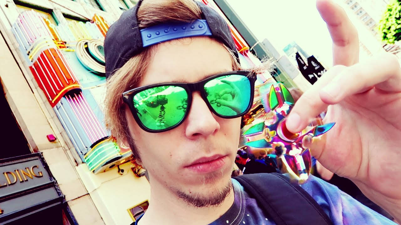 ElRubiusOMG wearing tinted sunglasses and exuding a chill, laid-back vibe Wallpaper