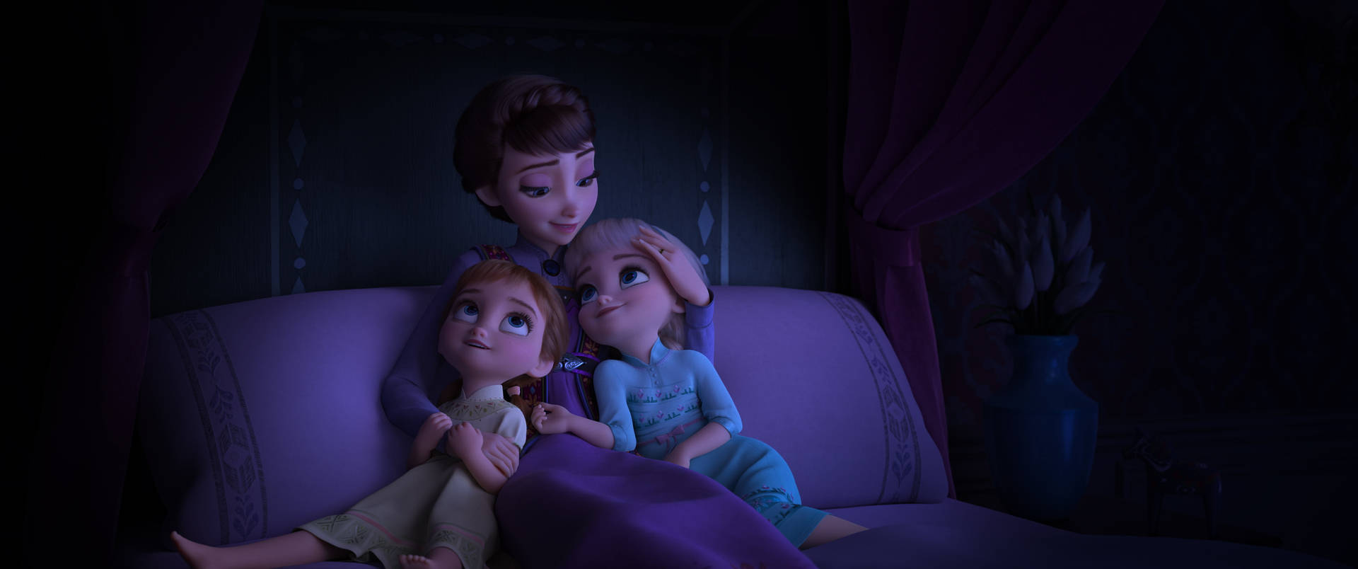 A heartwarming moment between Elsa, Anna, and their mother Iduna Wallpaper