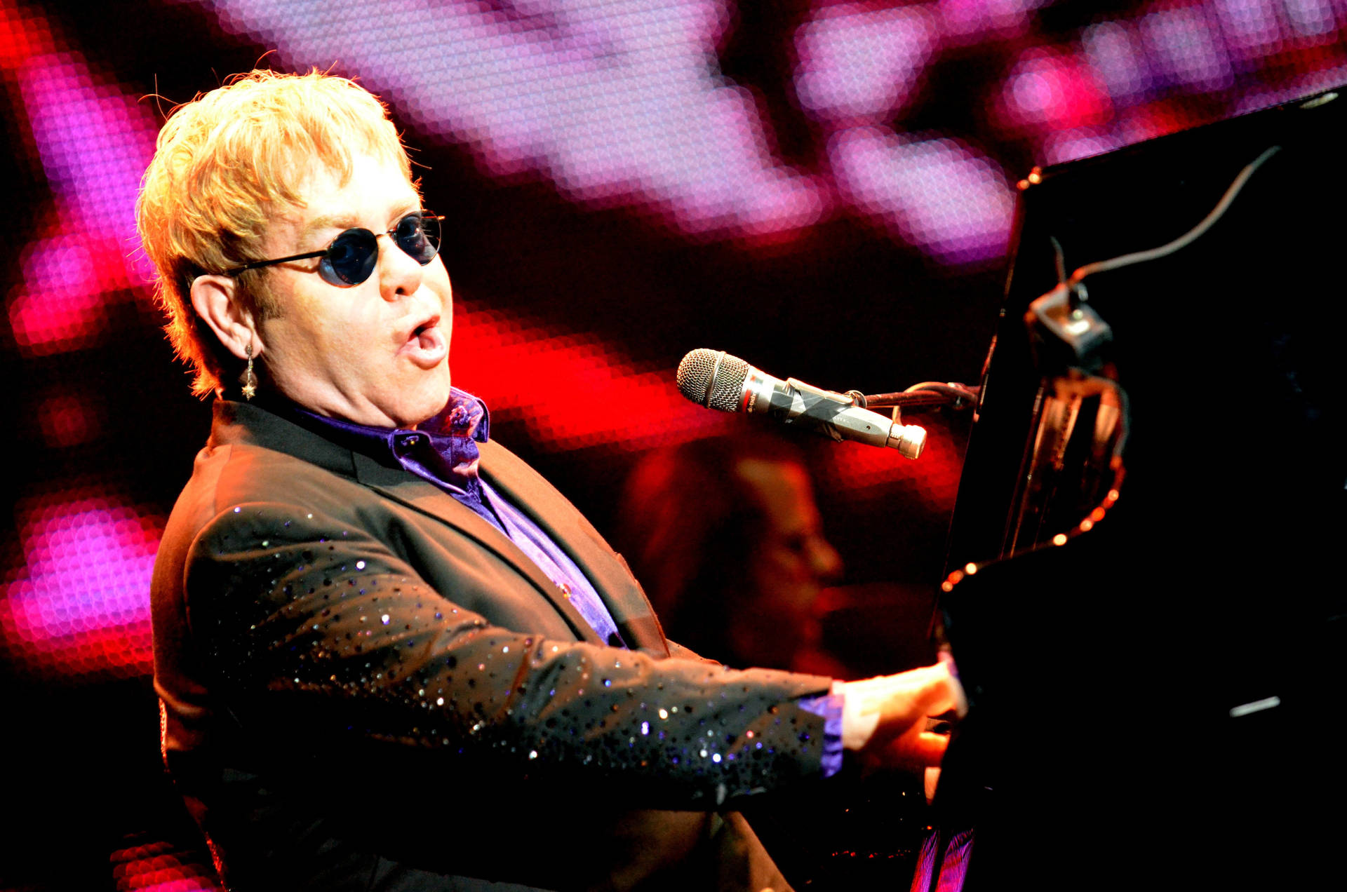 Elton John Pink Stage Concert Background