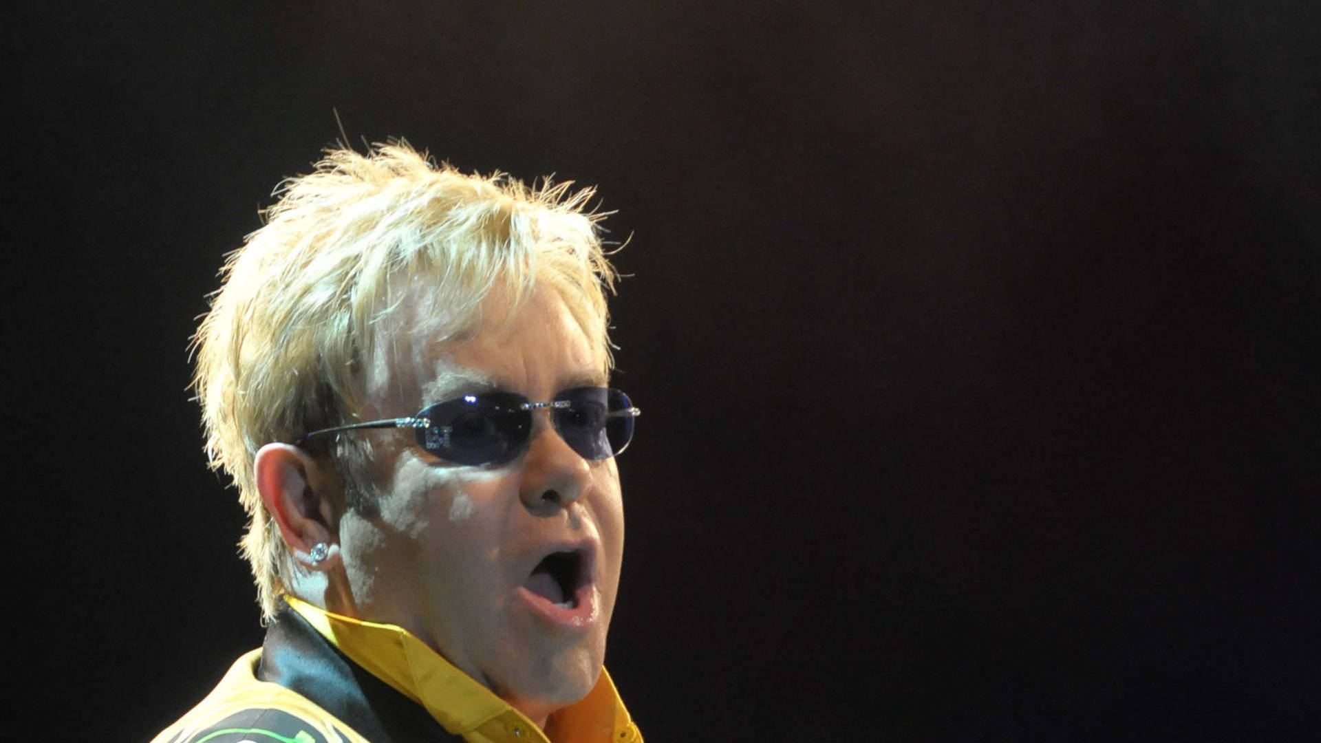 Elton John Yellow Suit Concert Background