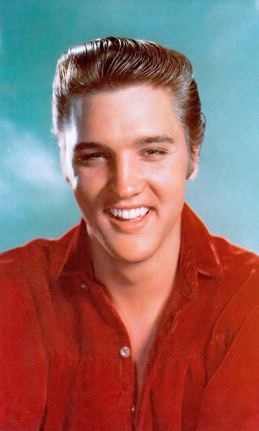 Etportræt Af Den Ikoniske Rocker Elvis Presley I Hans Storhedstid.