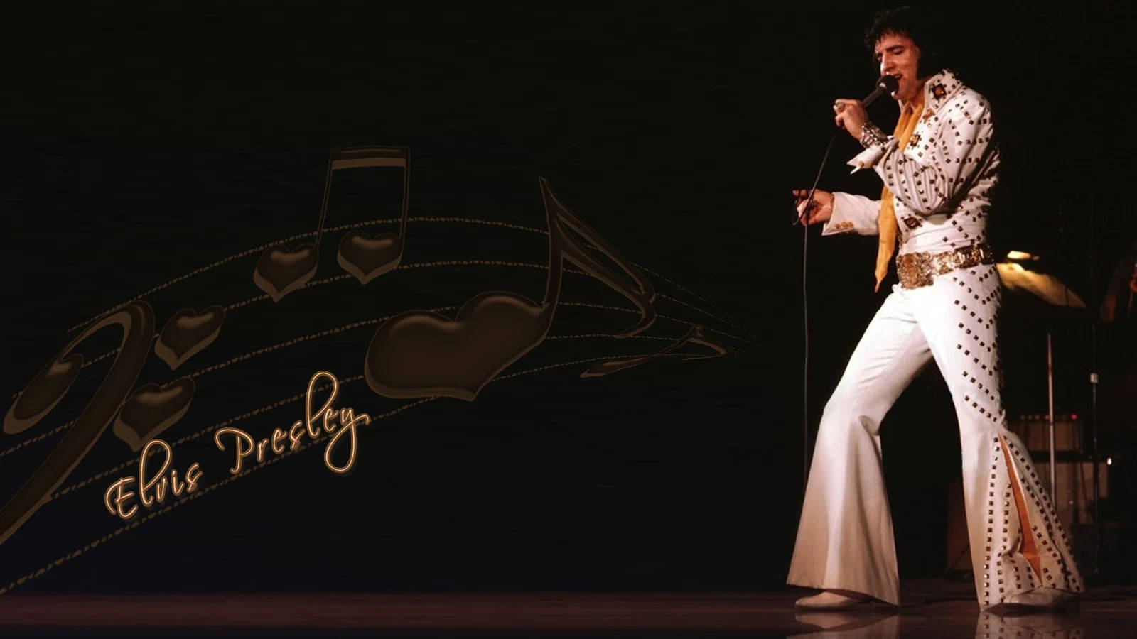 Elvis Presley In White On Stage Wallpaper