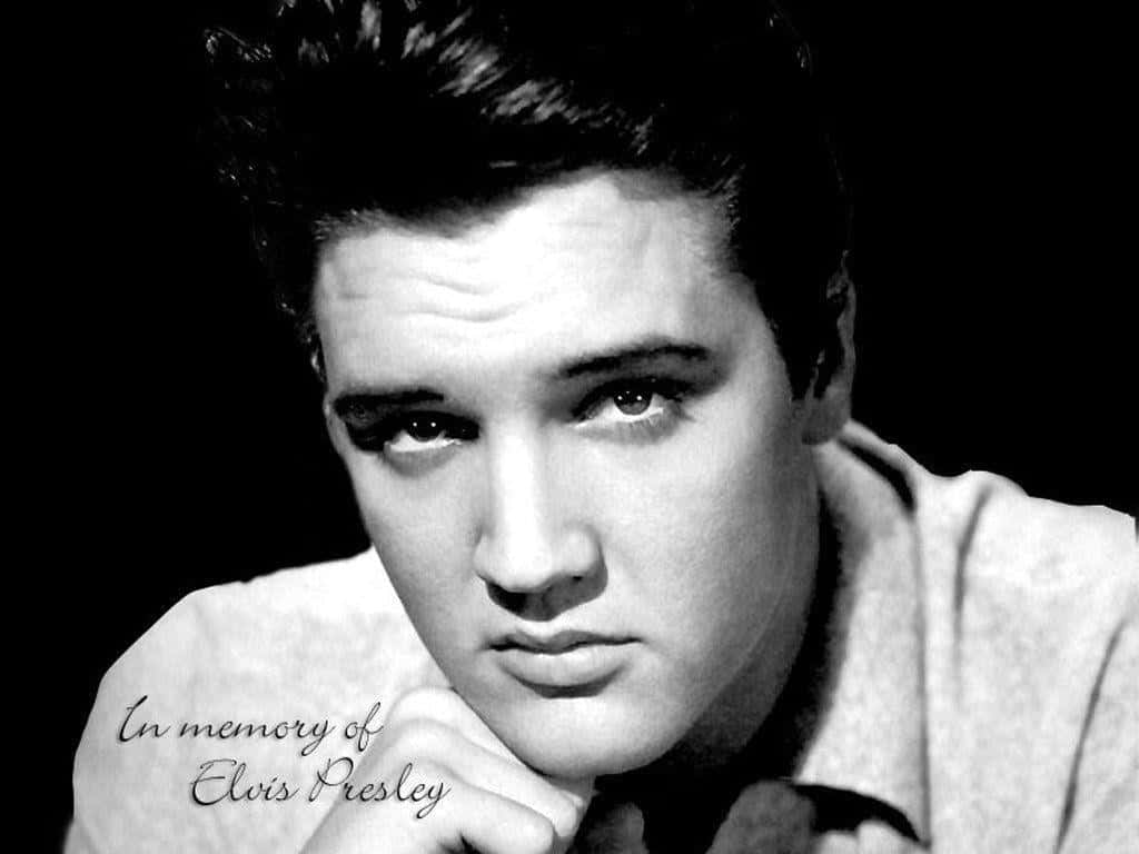 Elvis Presley's Face Is Shown In Black And White