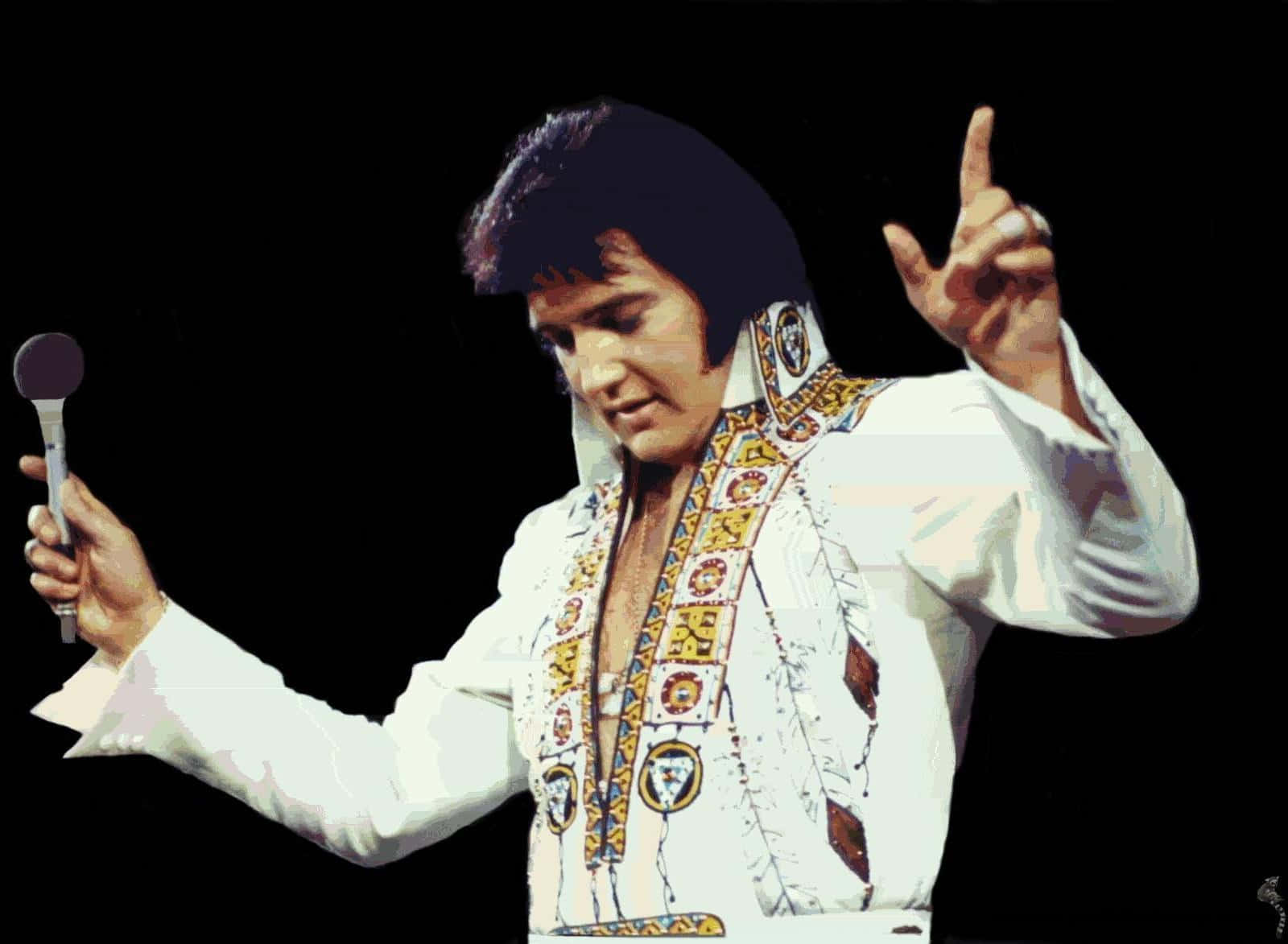 Elvis Presley In White Costume With Microphone