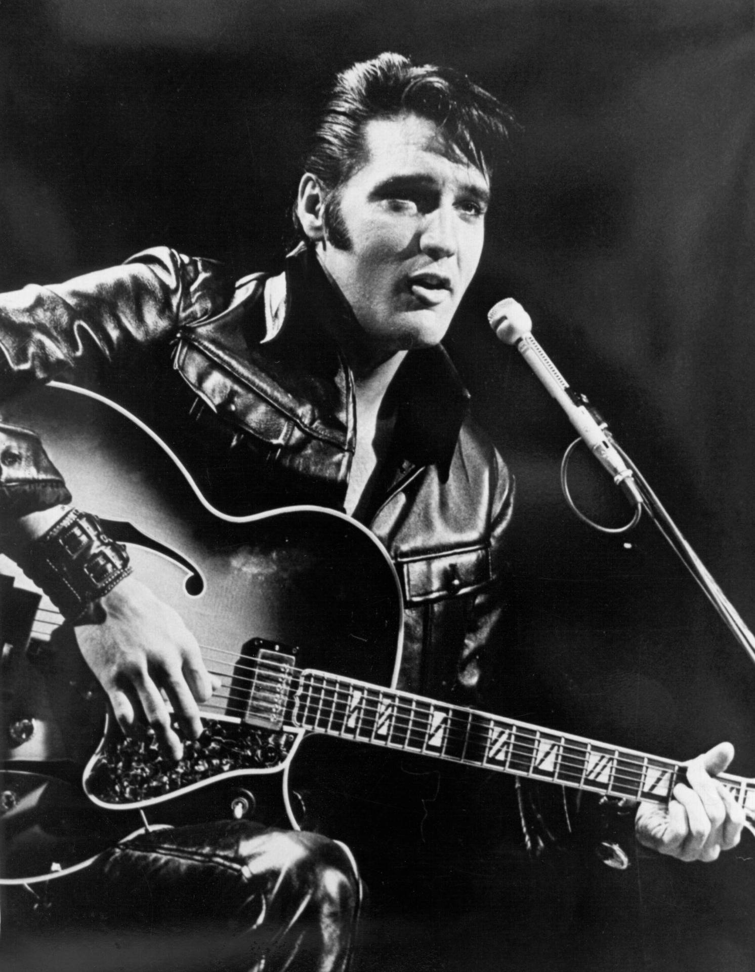Elvis Presley Playing Guitar Black And White Wallpaper