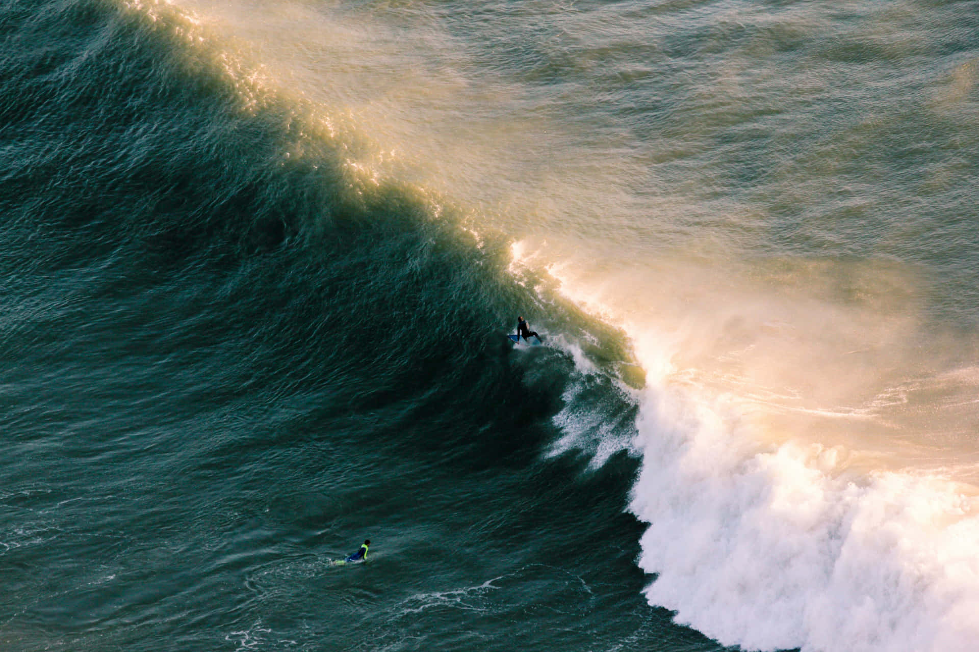 Emerald Wave Surfers Wallpaper