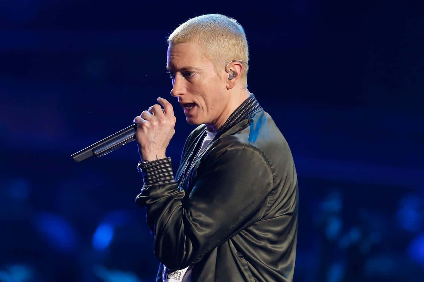 Eminem Performing Live on Stage with Energy and Passion