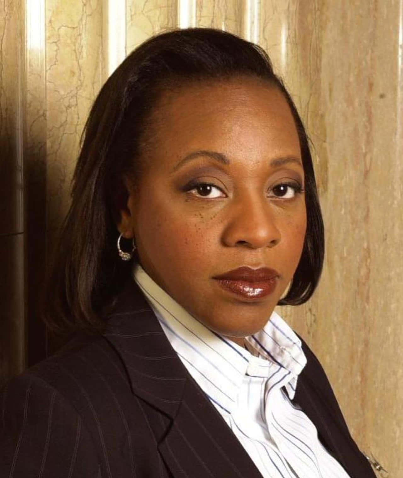 Eminent Actress Marianne Jean Baptiste In A Chic Ensemble Wallpaper