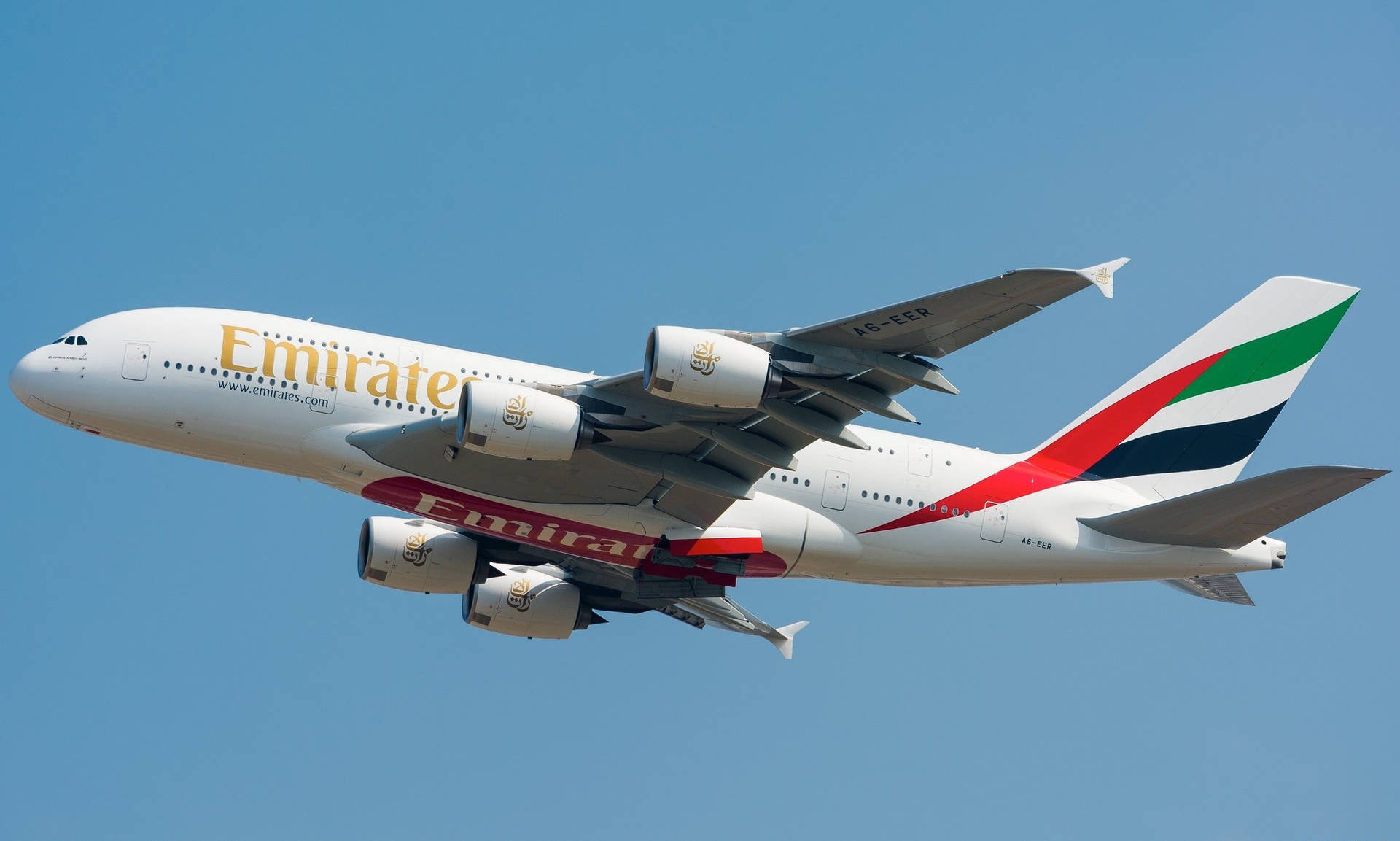 Majestic Emirates Airbus A380neo Soaring in the Sky Wallpaper