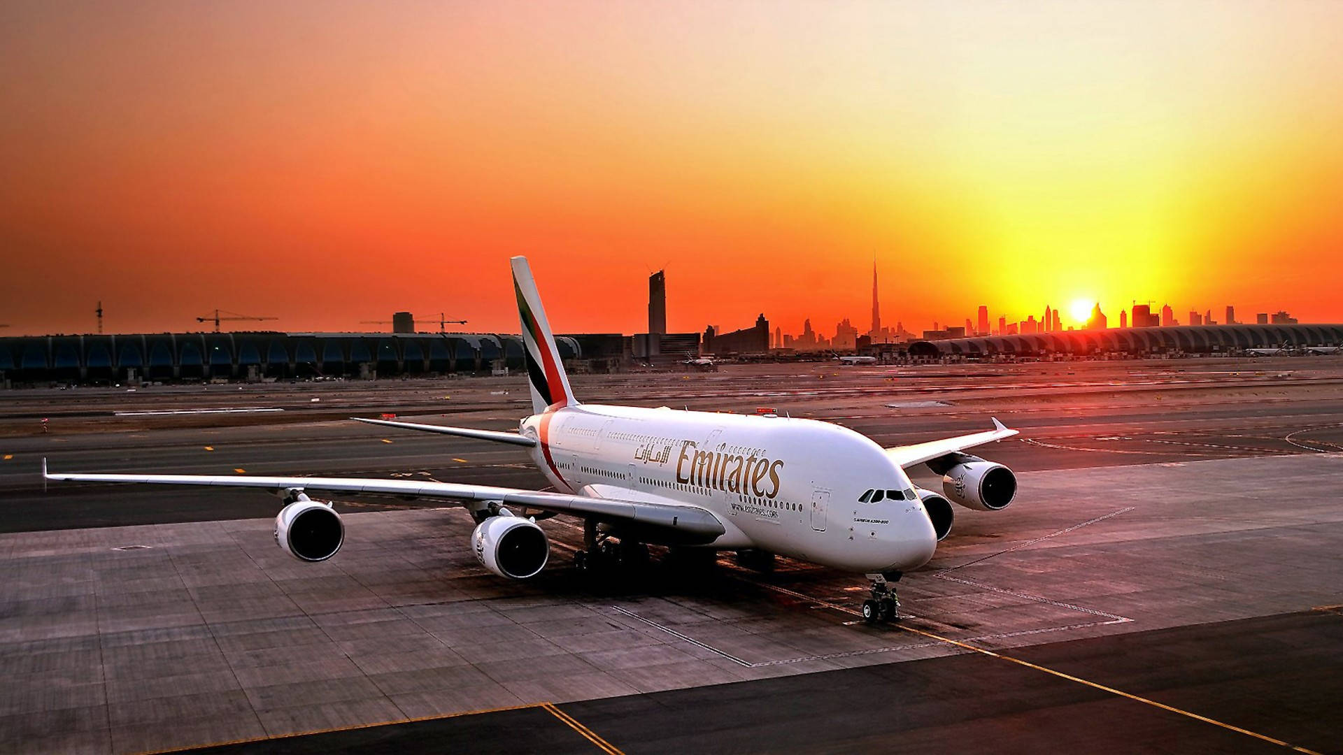 Download Emirates Airplane At The Airport Wallpaper 
