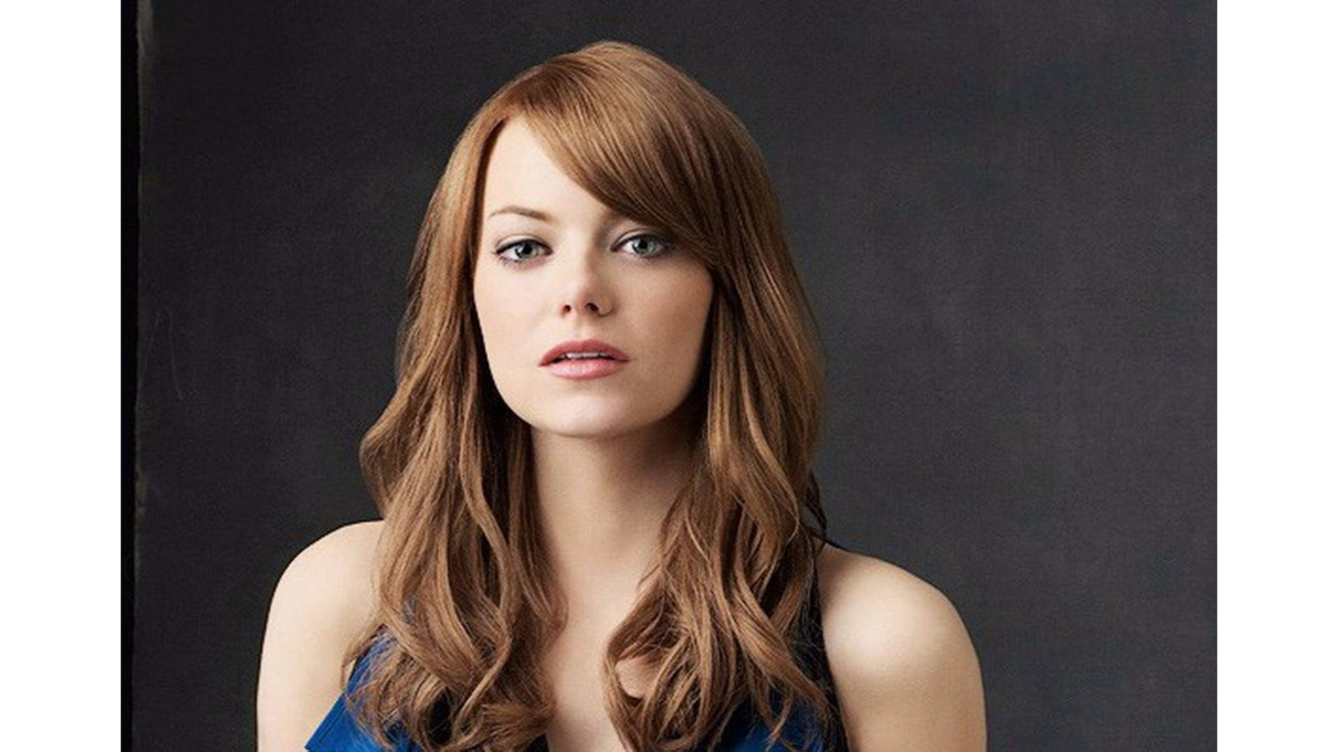 Actress Emma Stone in her famed movie Easy A Wallpaper