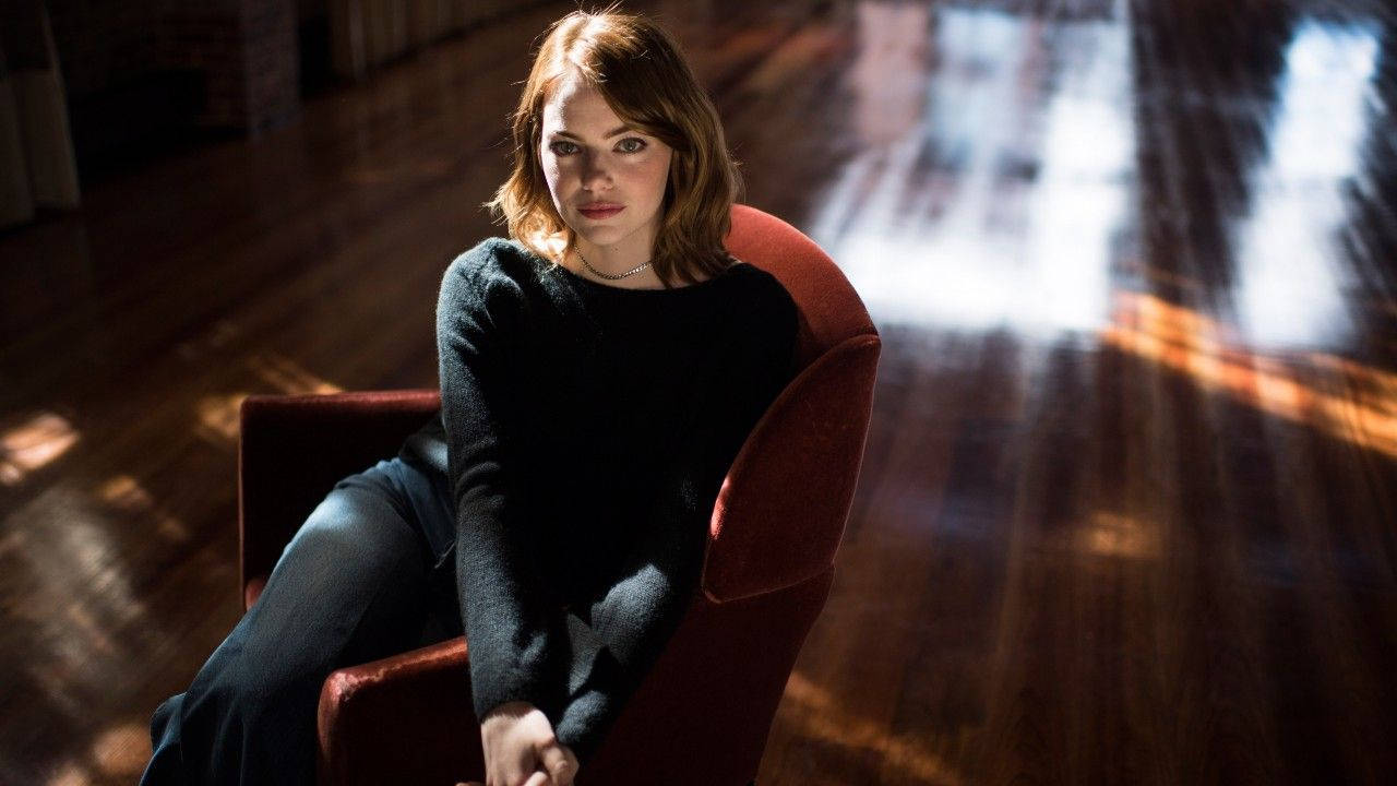 Emma Stone in captivating lighting Wallpaper