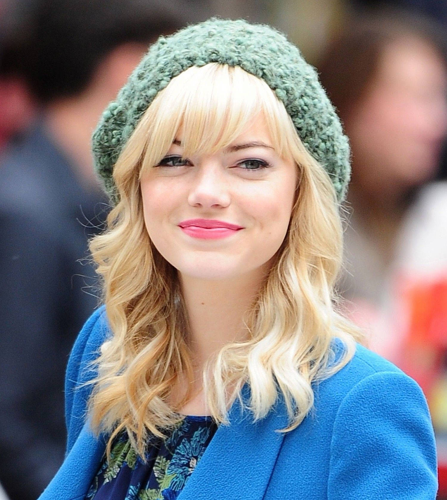 Emma Stone exudes confidence in a classic military inspired look. Wallpaper