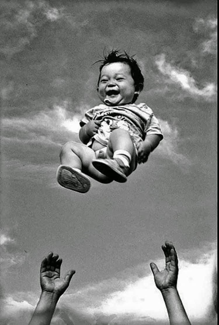 Emotion Happy Child Thrown In Air Picture