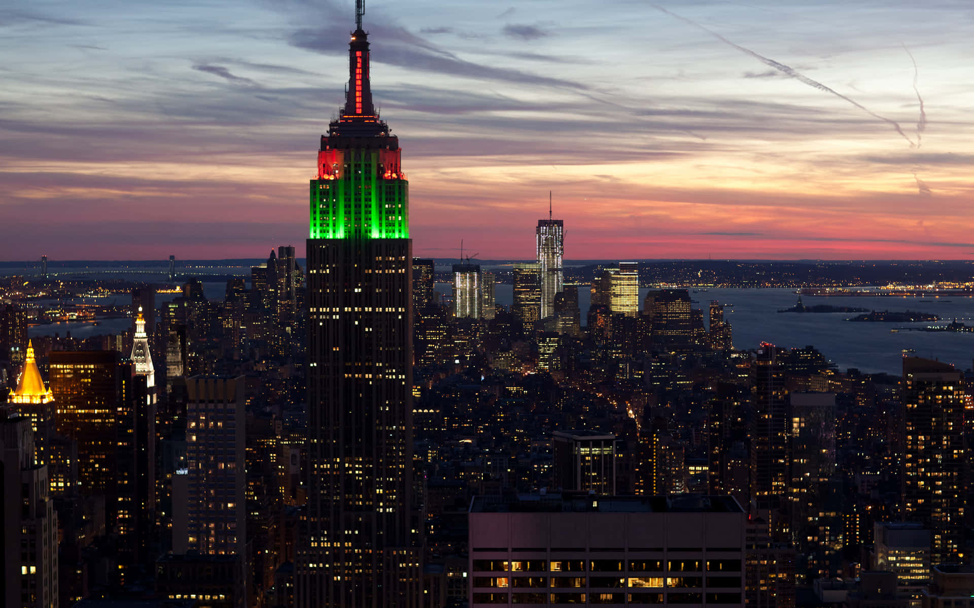 Experience the beauty of the world-famous Empire State Building lit up at night.