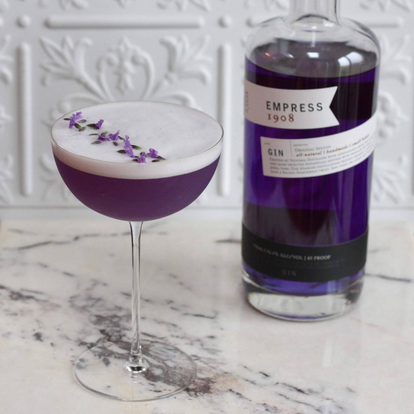 Empress 1908 Gin With Frothy Cocktail Wallpaper