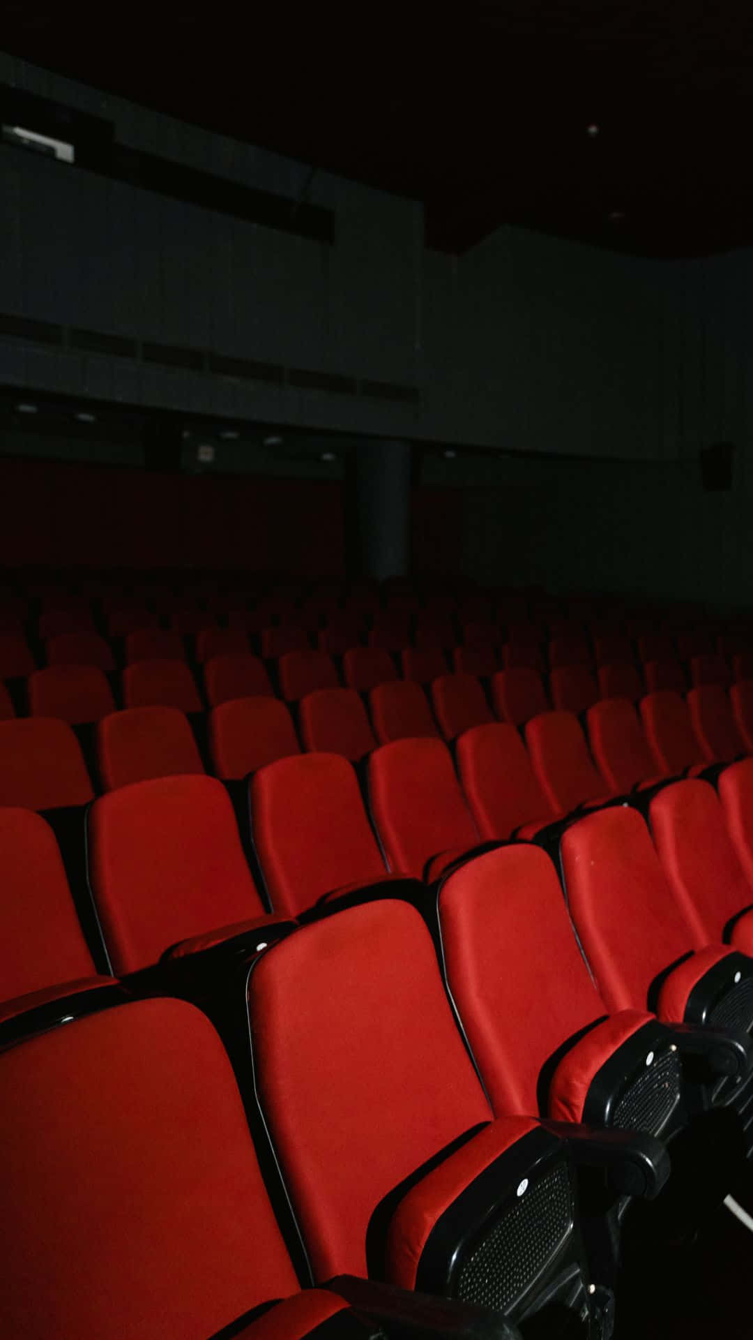 Empty Cinema Hall Red Seats Wallpaper