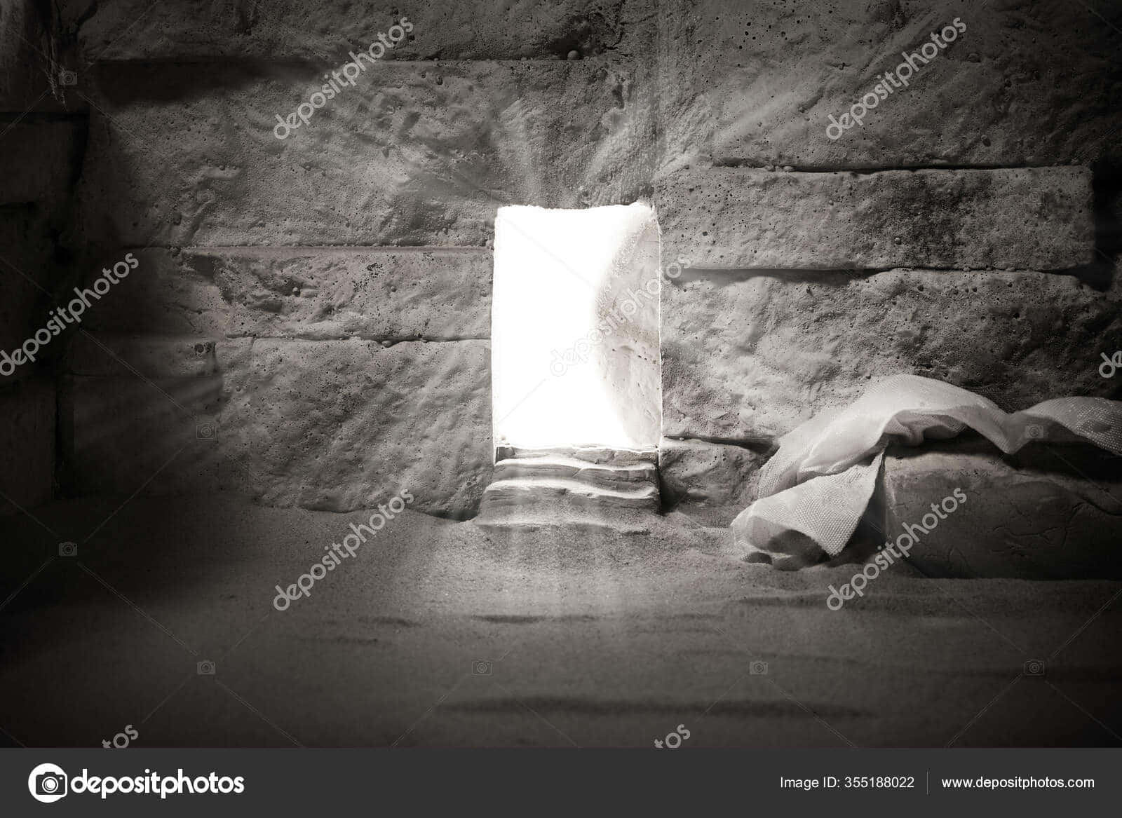 A Man Is Standing In A Cave With A Light Shining Through The Door Wallpaper