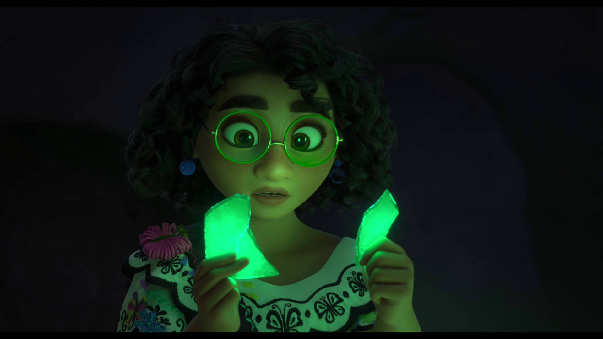 A Girl Holding A Glowing Green Crystal Wallpaper