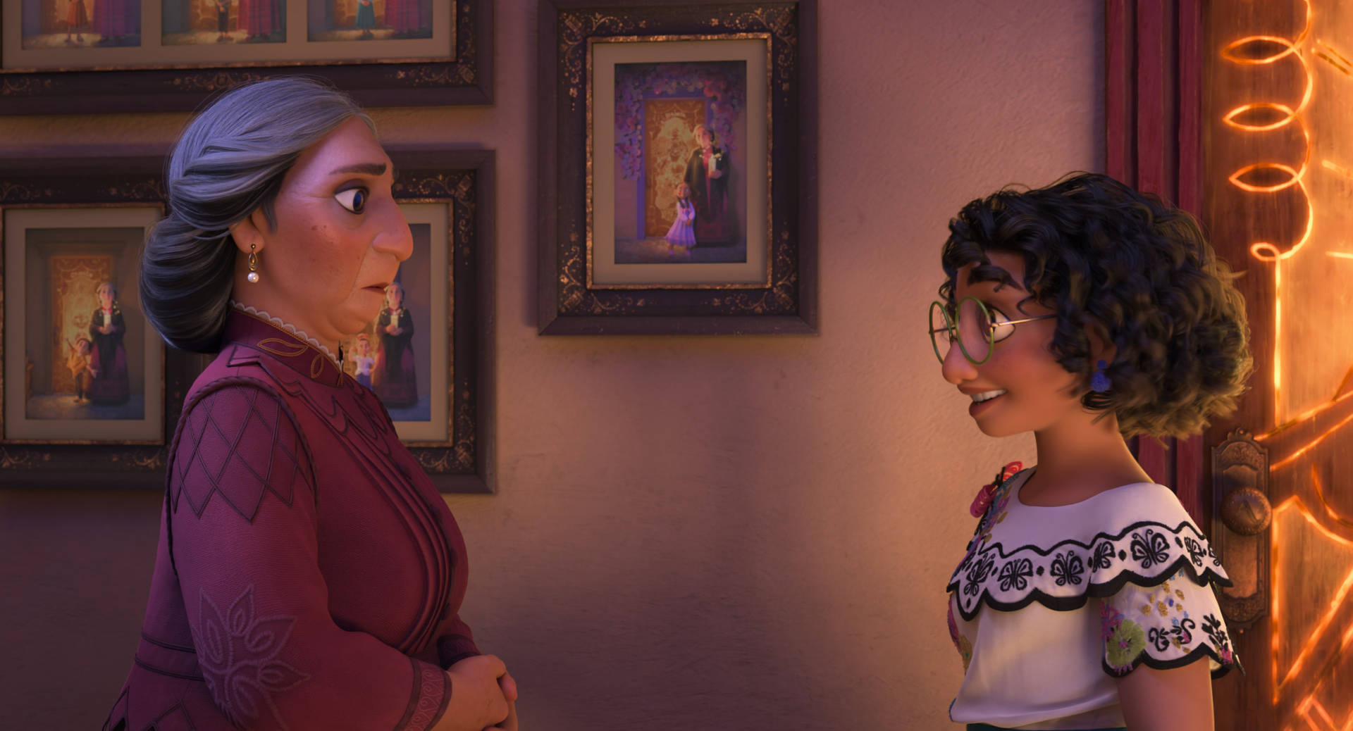 Mirabel in an intense conversation with Abuela Alma in Disney's animated movie, Encanto Wallpaper