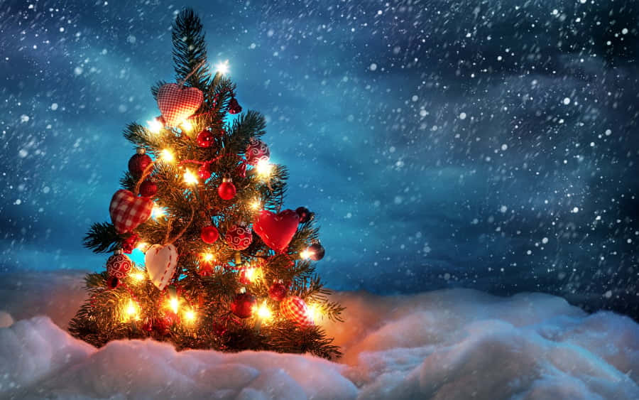Enchanted_ Christmas_ Tree_ Snowfall.jpg Wallpaper