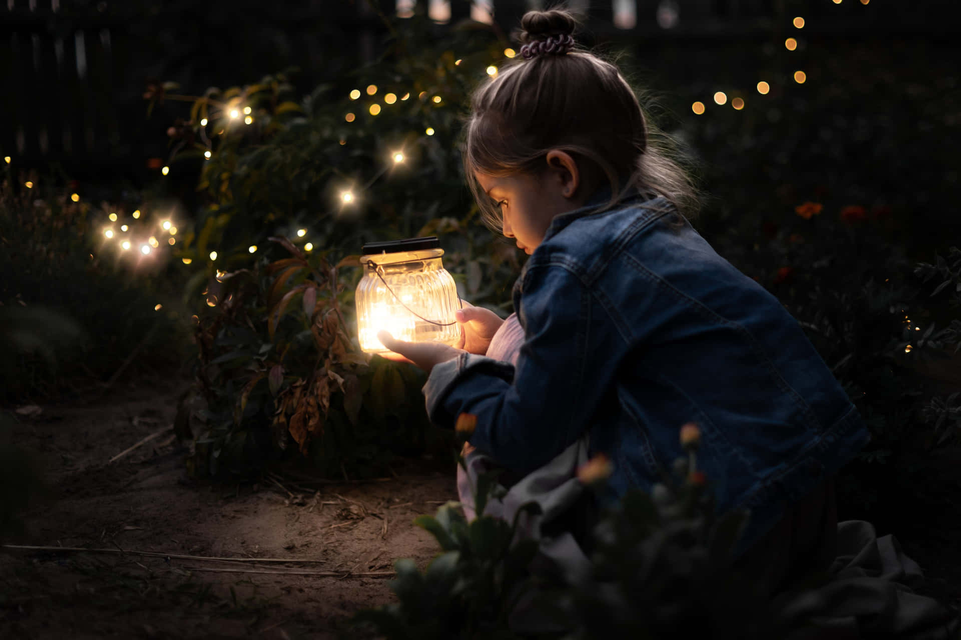 Enchanted Evening Little Girlwith Lantern Wallpaper