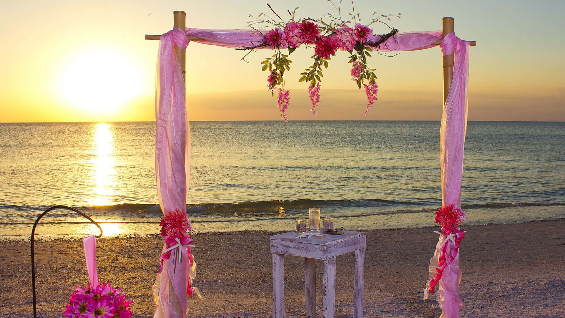 Enchanting Beach Wedding Moment Wallpaper