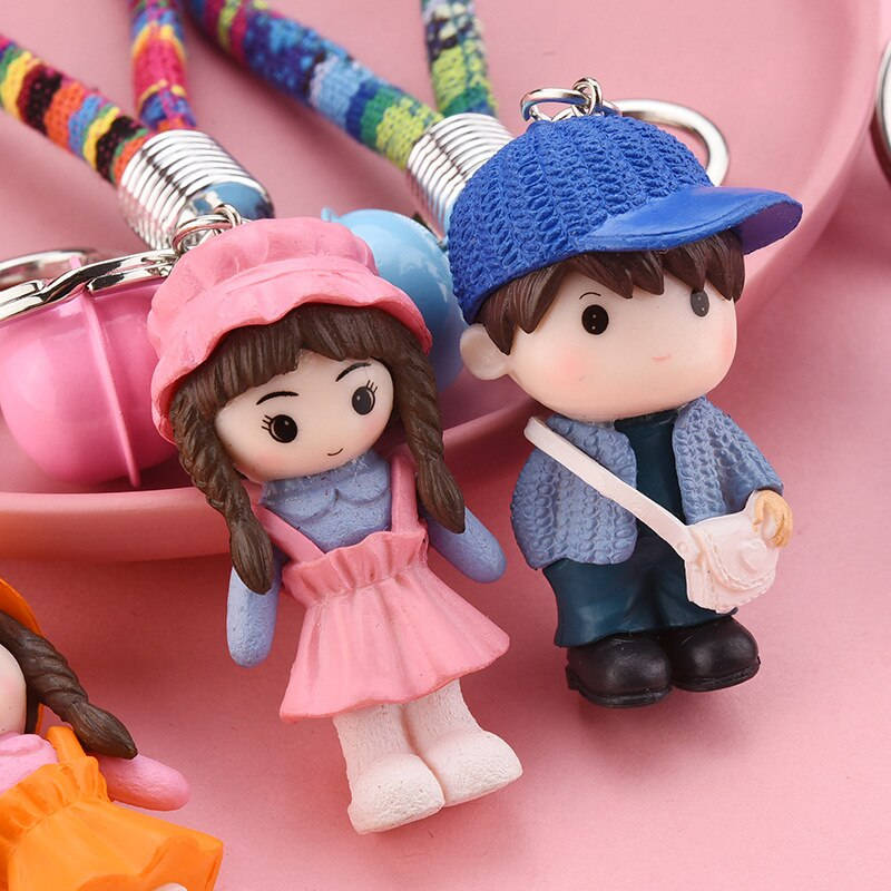 "enchanting Display Of Love: Adorable Doll Couple" Wallpaper