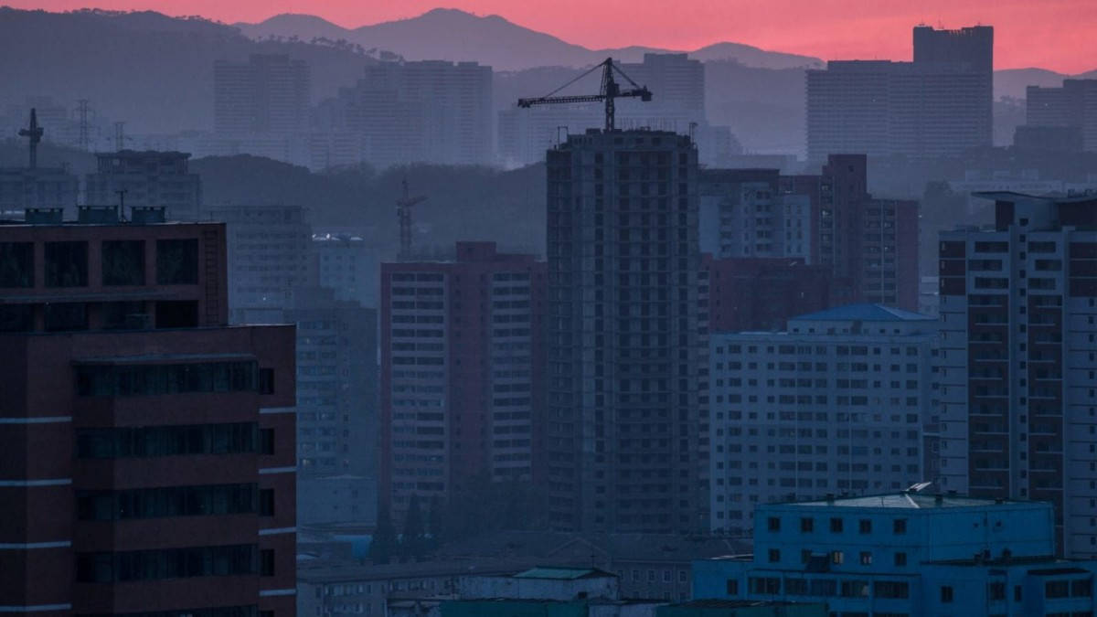 Enchanting Nighttime Skyline Of Pyongyang, North Korea Wallpaper