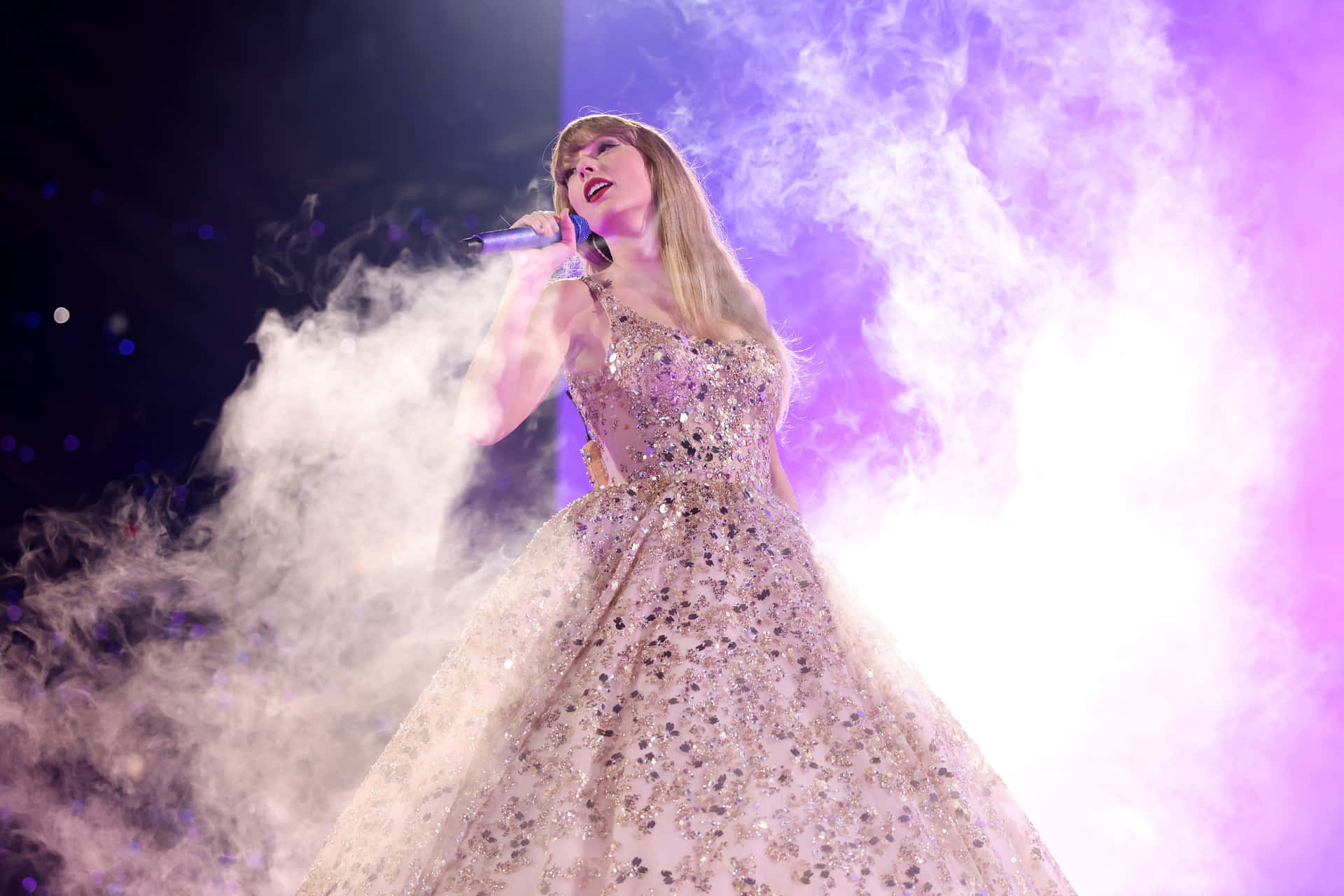 Enchanting Singer Stage Performance Wallpaper