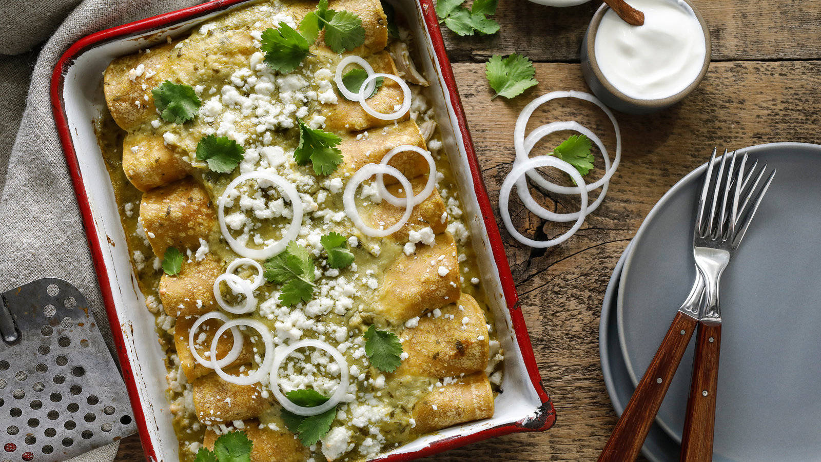 Enchiladas Tray Topped With Onion Rings Wallpaper