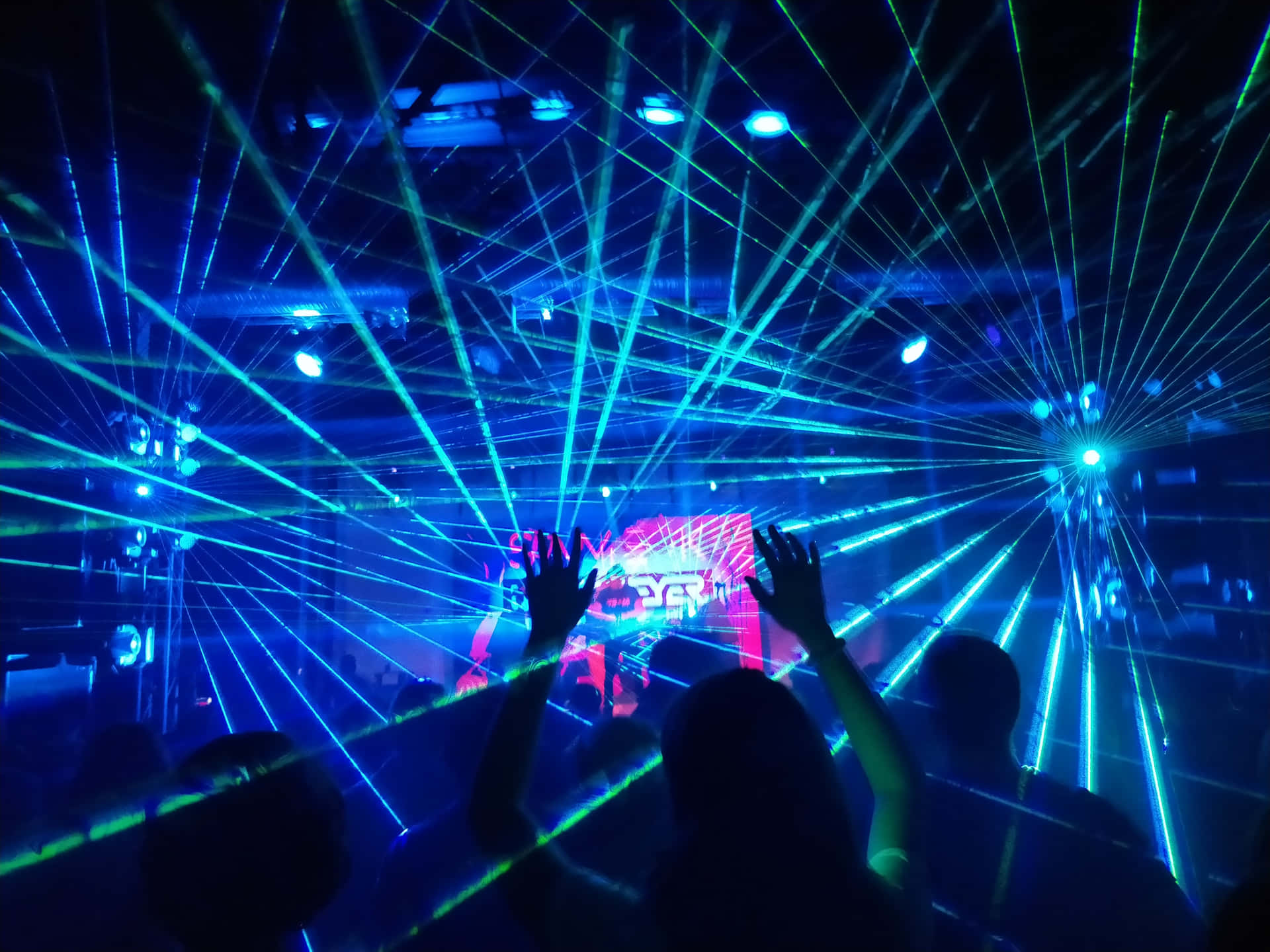 Energy Unleashed At Neon Dance Wallpaper