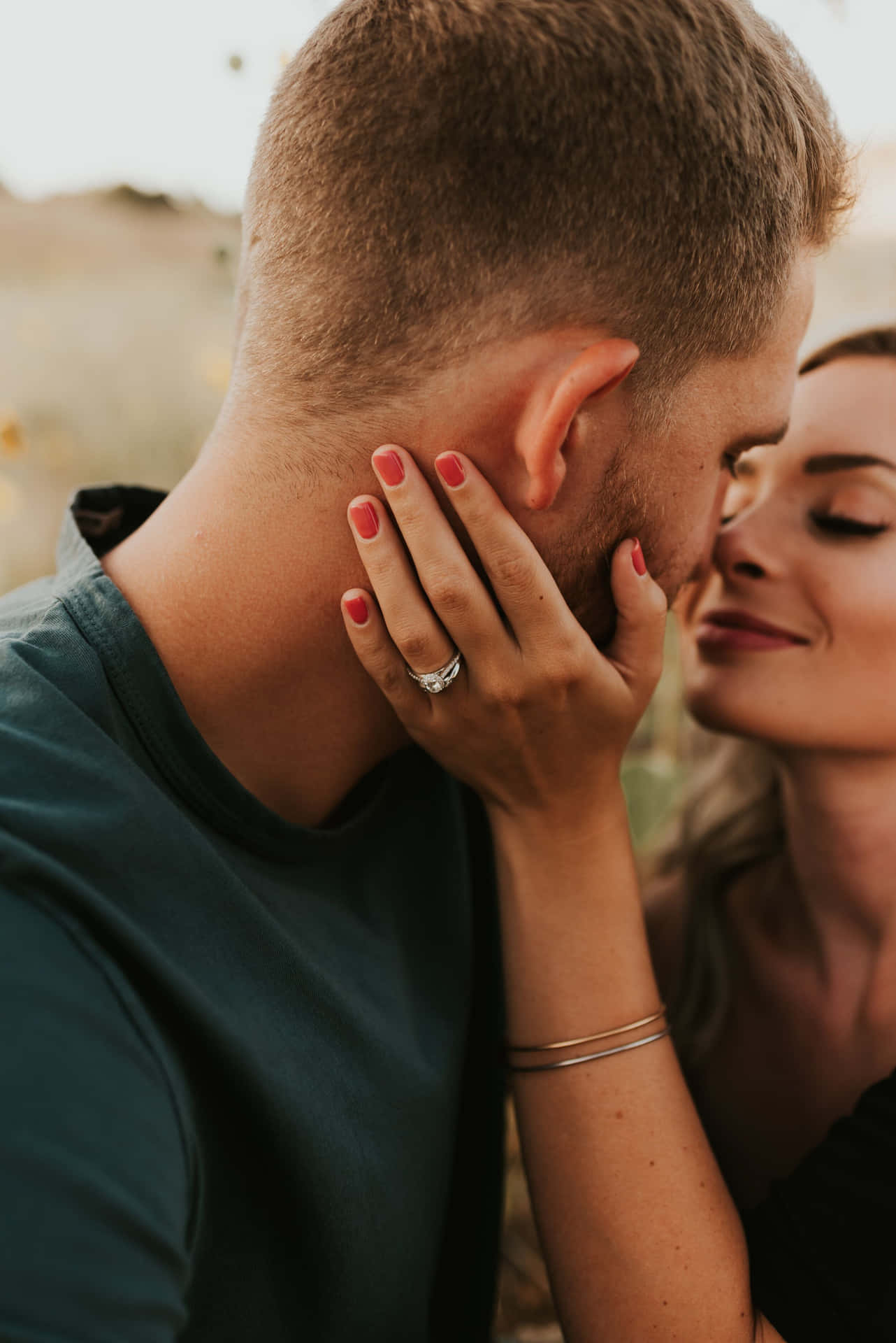 Engagement Ring Woman Cupping Man's Cheeks Pictures