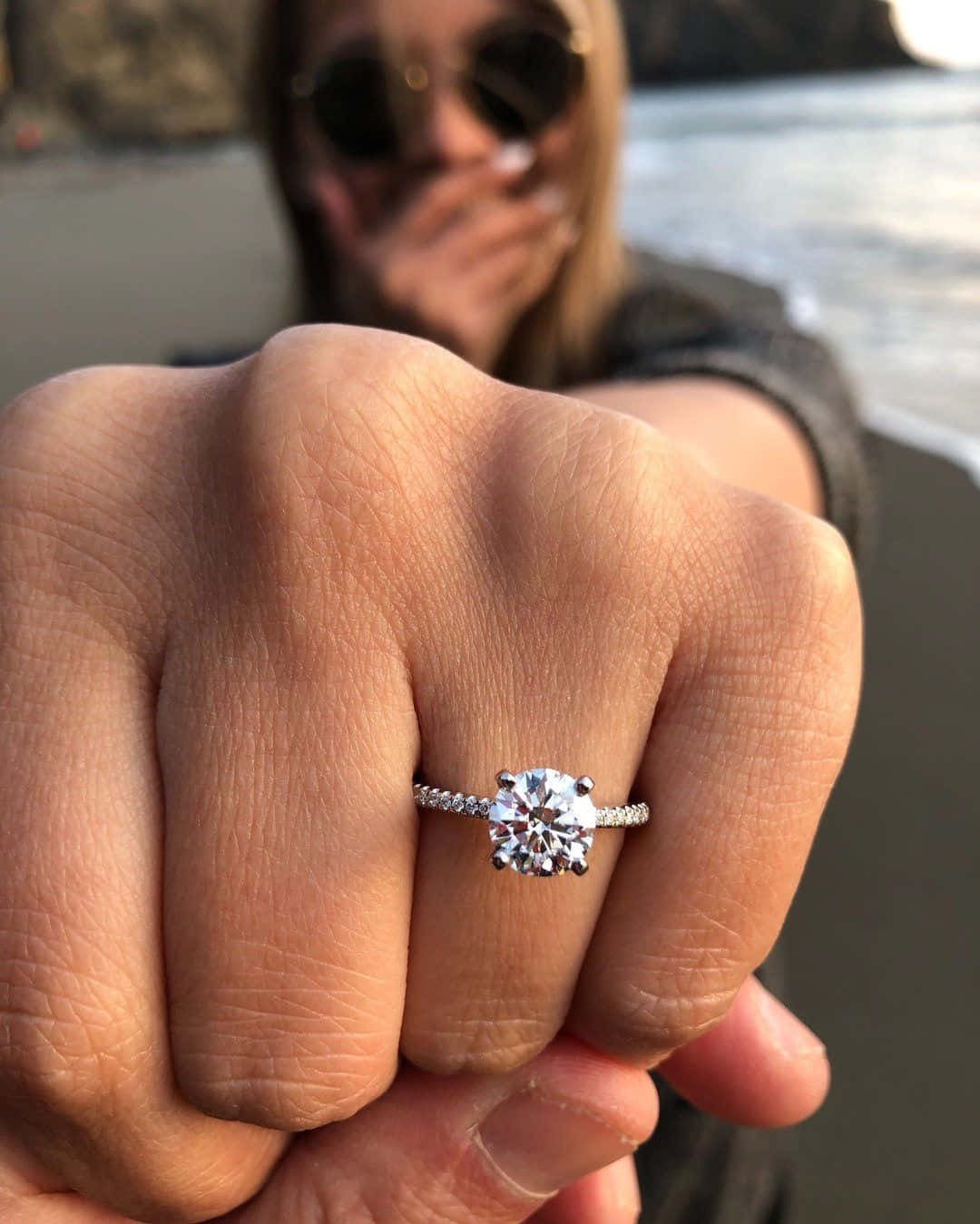 Engagement Ring On Fist At Beach Pictures