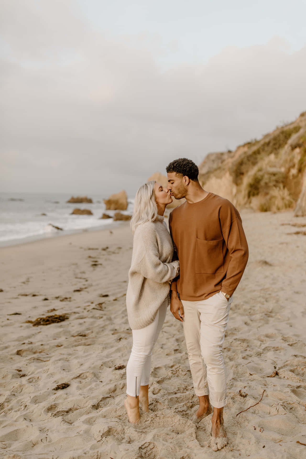 Engagement Couple Kissing On Beach Pictures