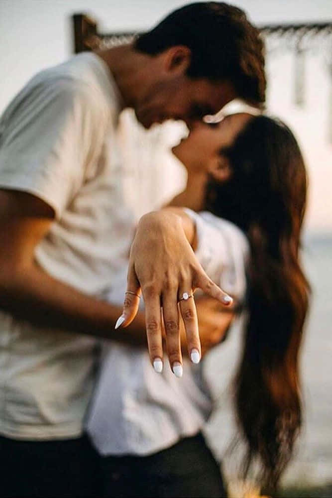 Engagement Ring Couple In White Shirts Pictures
