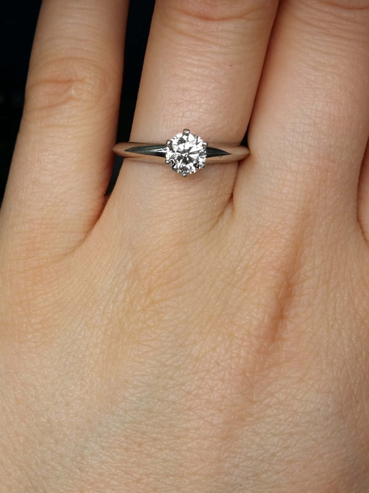 Elegant Diamond Engagement Ring Showcased on Velvet Material