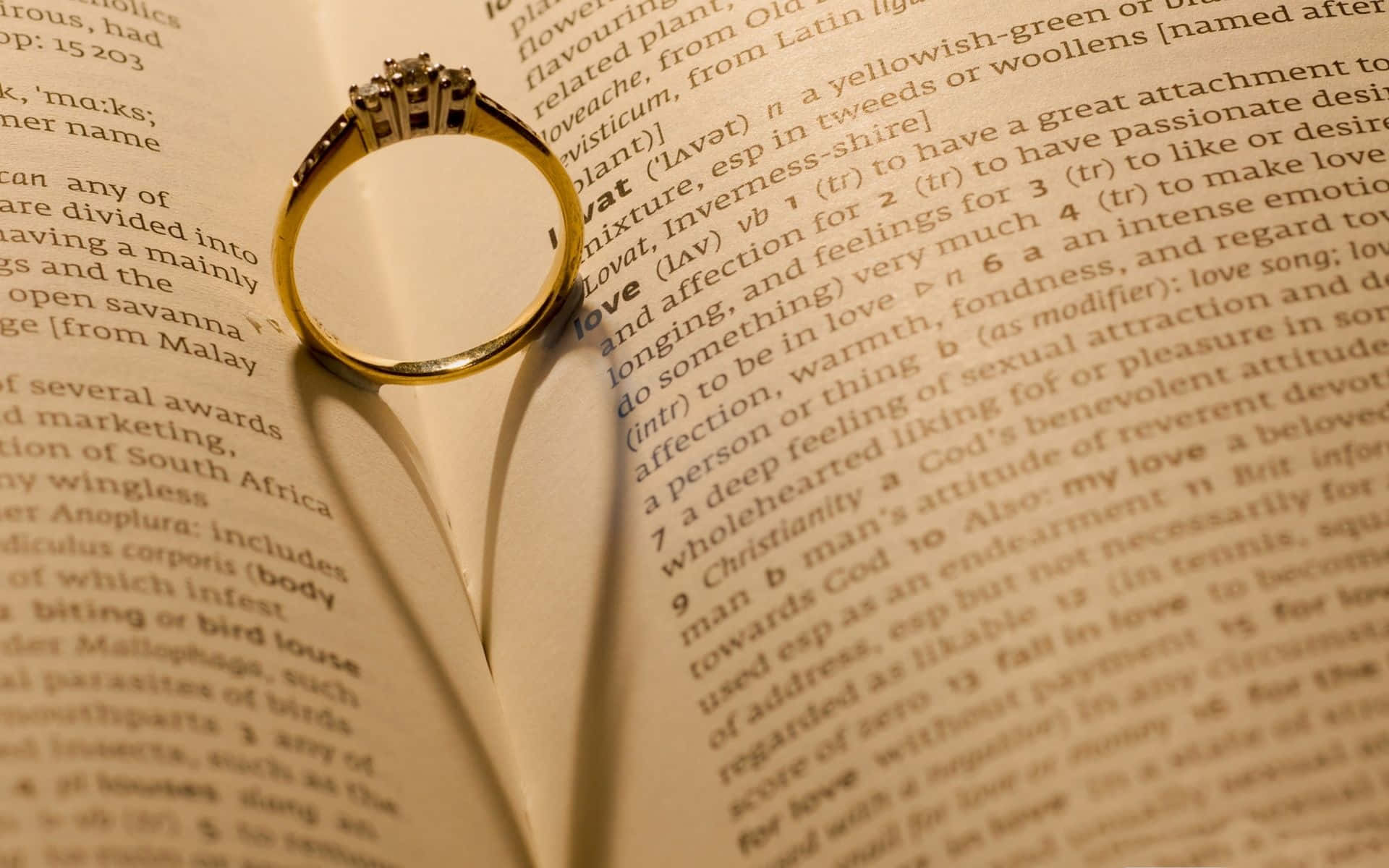 Engagement Ring In Between Pages Picture