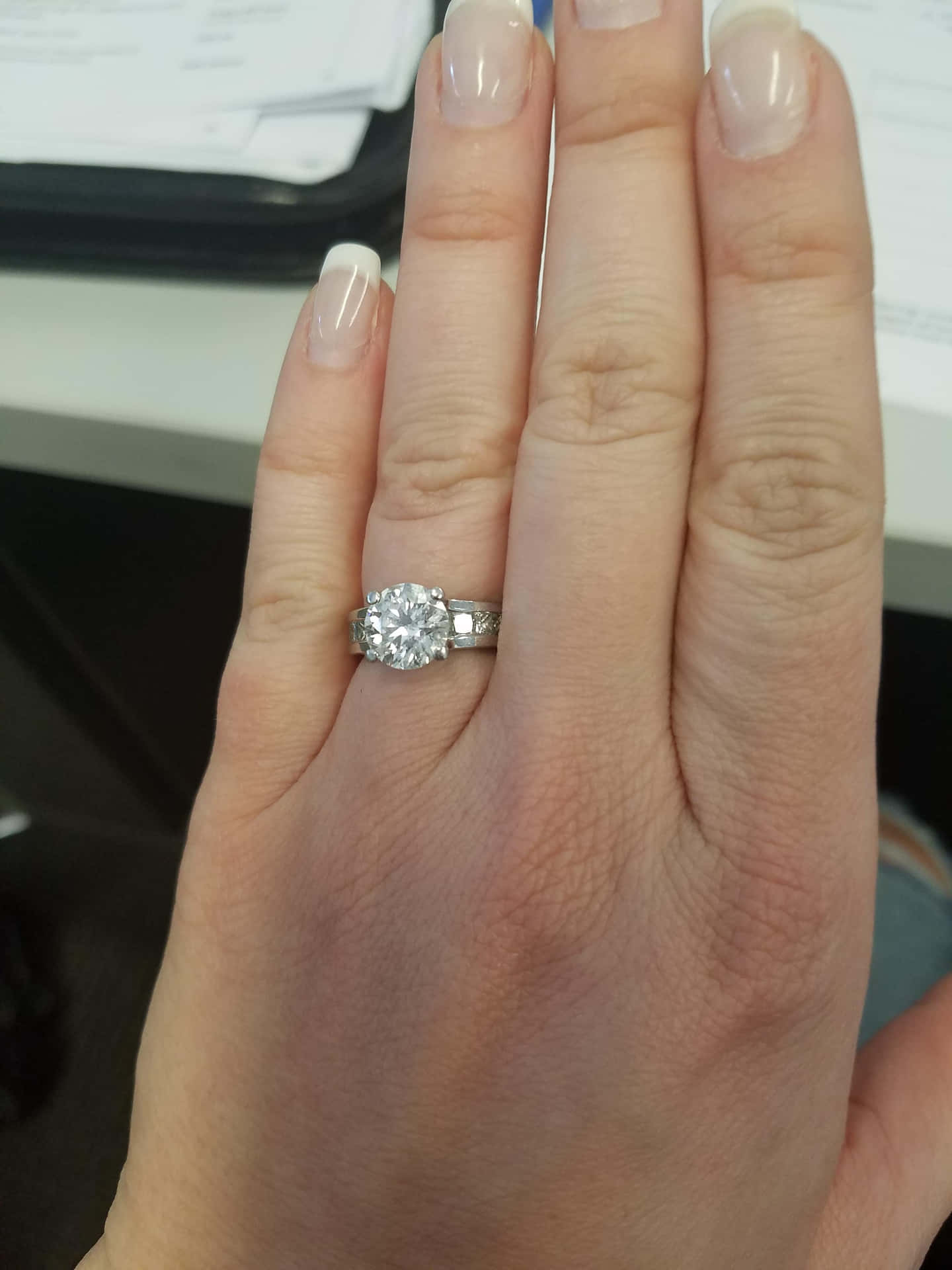 Woman Showing Engagement Ring Picture