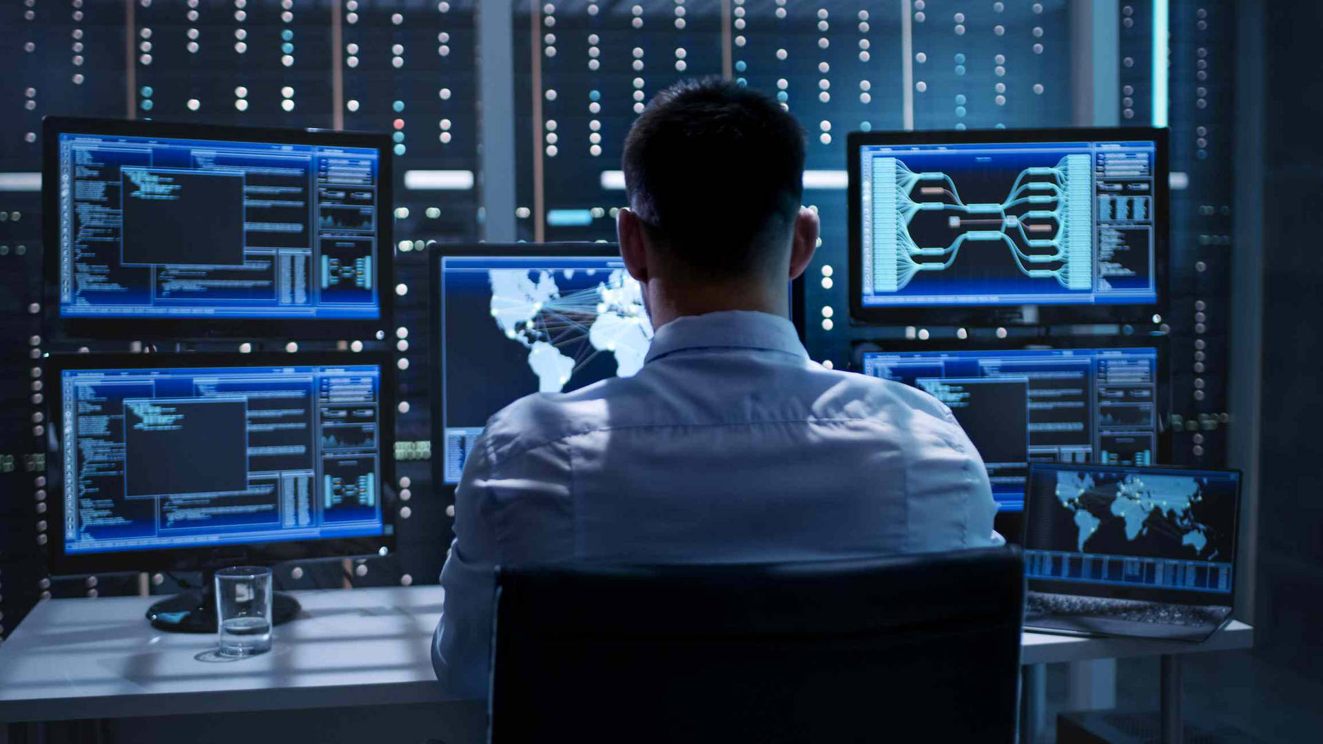 Engineer Working With Computers Wallpaper