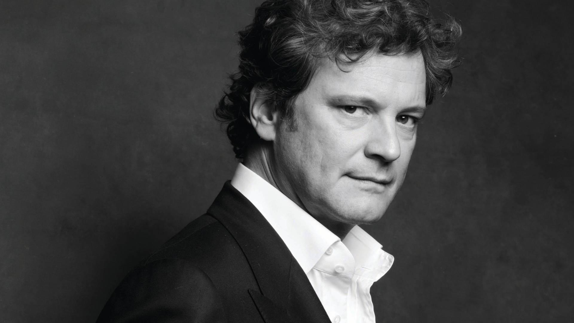 English Actor Colin Firth Black And White Medium Shot Wallpaper