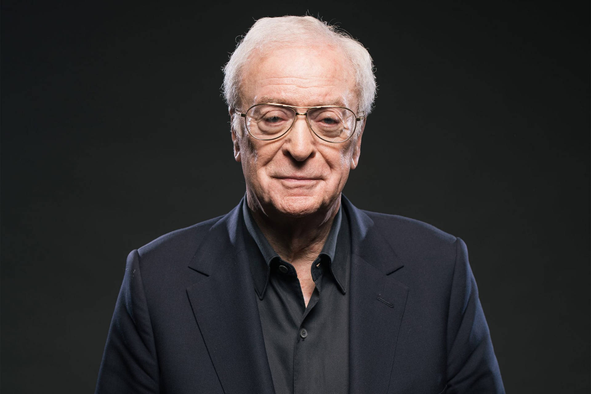 English Actor Michael Caine Handsome In Black Wallpaper