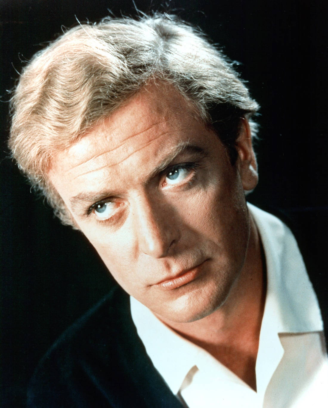 Acclaimed English Actor Michael Caine in Portrait Photography Wallpaper