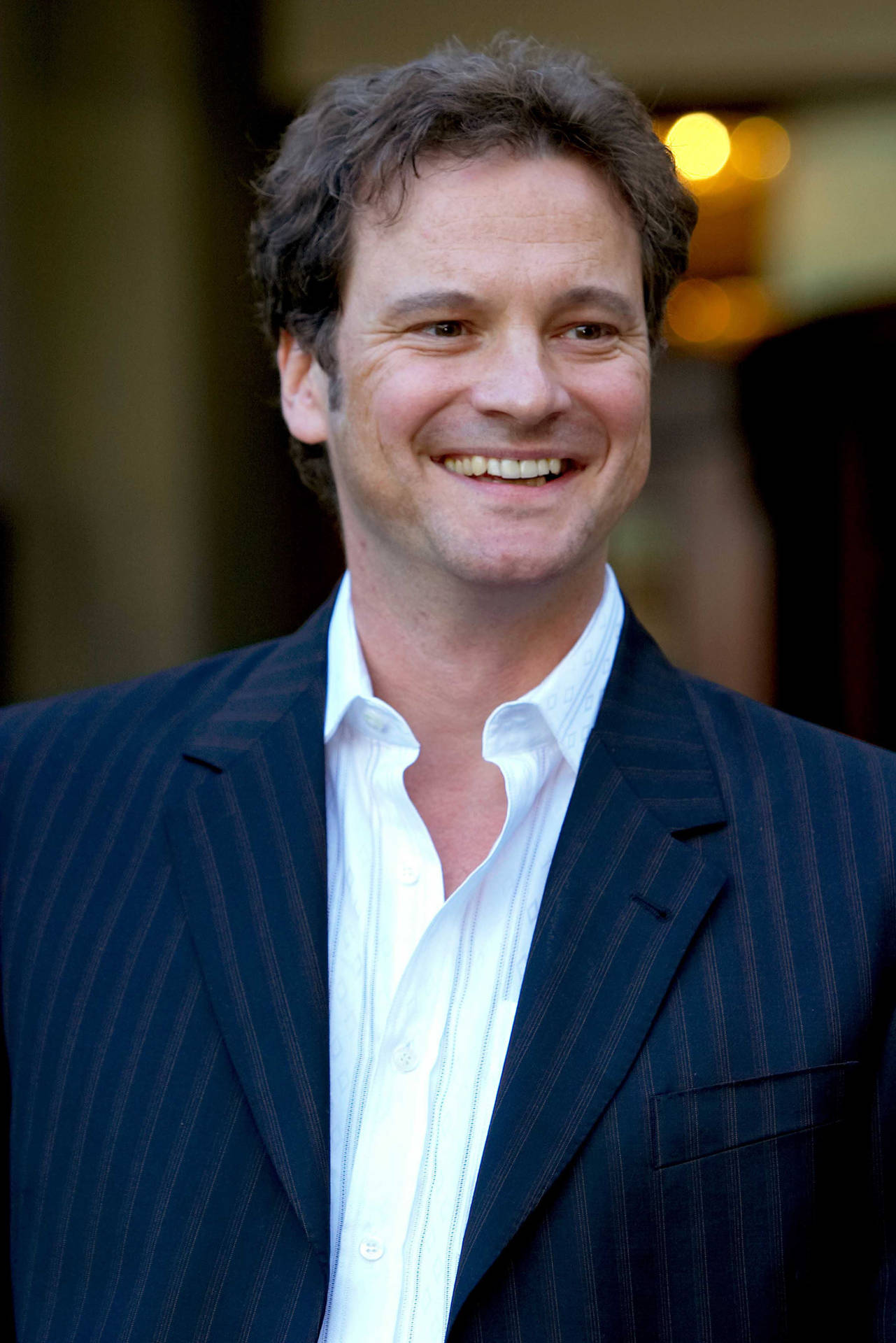 British Actor Colin Firth in a Candid Moment Wallpaper